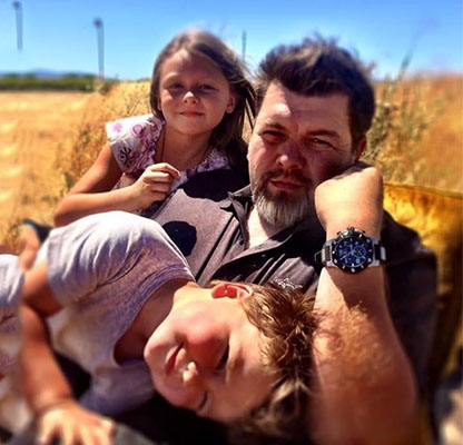 Father and two young daughters